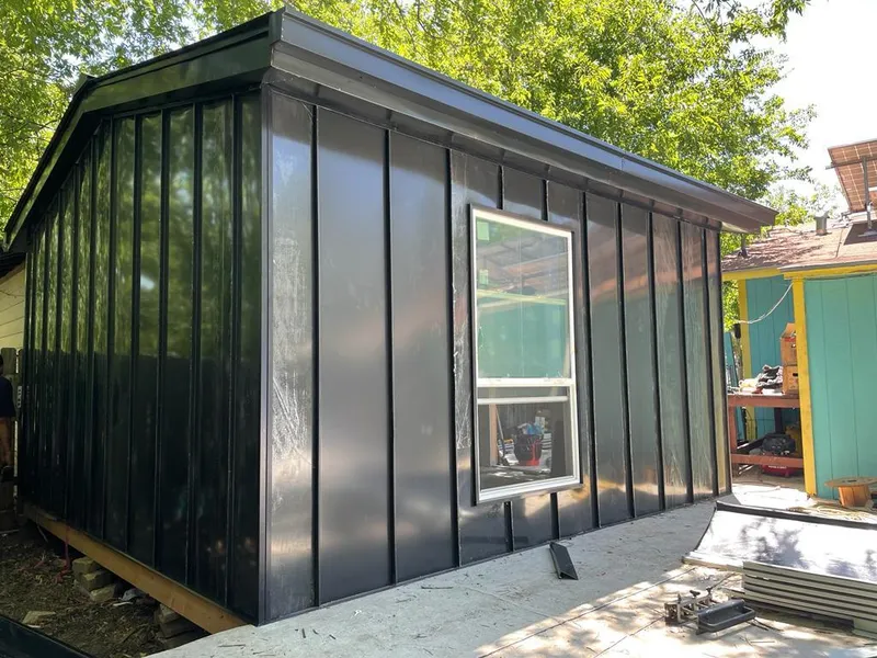 Black standing seam metal wall panels for Metal Roof Installation in Marion